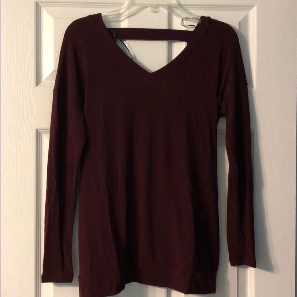 Women’s burgundy cross back long sleeve top